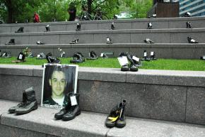 Combat boots set out as a tribute to fallen soldiers at an antiwar Memorial Day event in Chicago in 2008