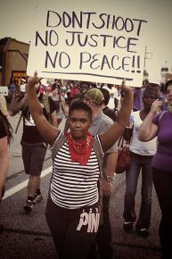 Marching along West Florissant in Ferguson, Mo.