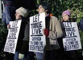 Opponents of the death penalty stand for Stan Tookie Williams